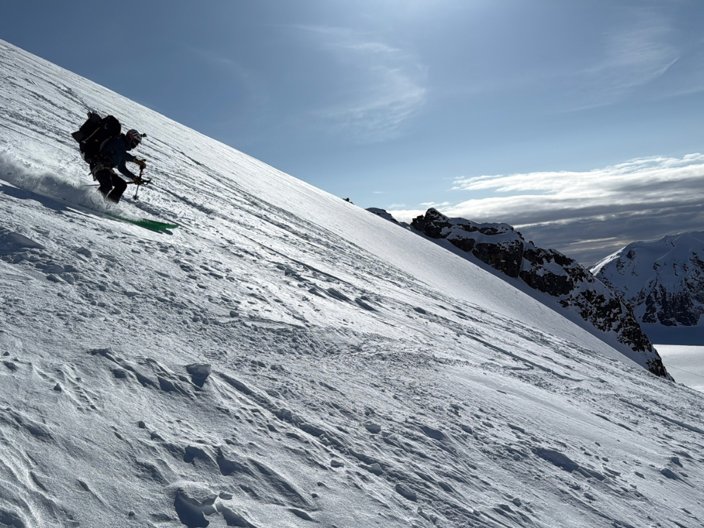 Skiing down the Overlord Glacier with a 60 pound pack