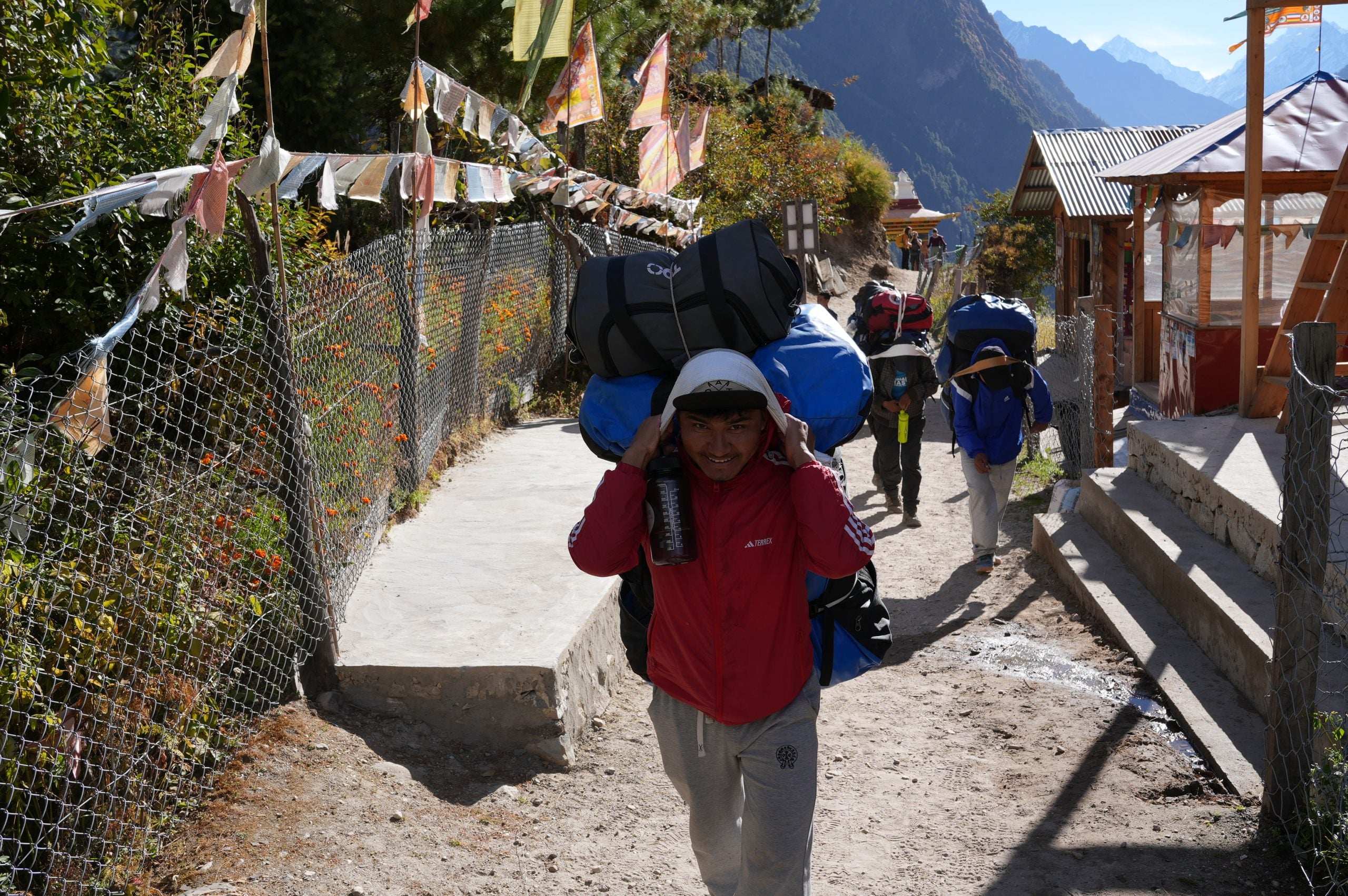 Buddha, one of our porters, carrying a heavy load on the Manaslu Circuit